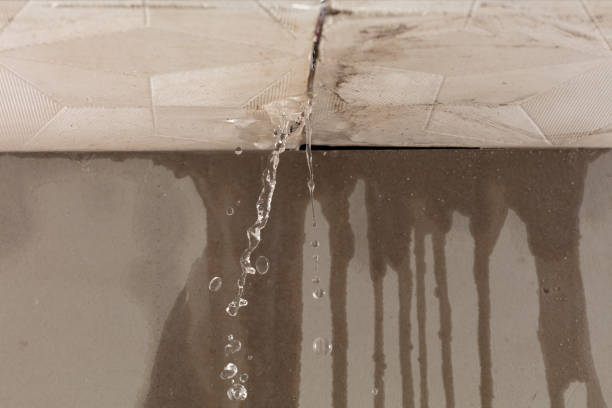 Professional Flood Damage Cleanup technician working in Pleasantville, PA